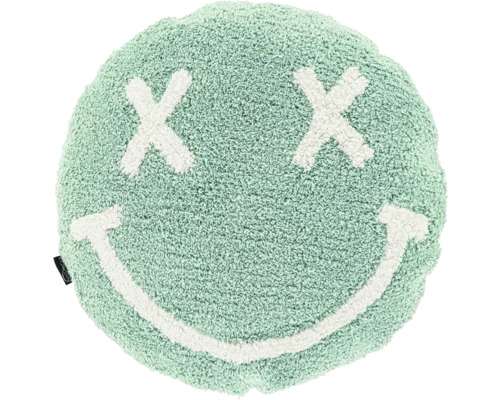 Rond, zacht getuft kussen in mintgroen met wit smiley-gezicht, X-vormige ogen en een brede glimlach.