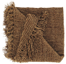 Woondeken met wafelstructuur en franjes in bruin.