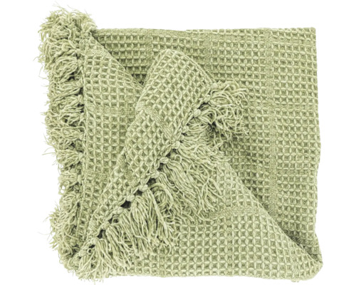 Groene plaid met wafelstructuur en franjes.