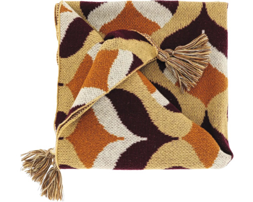 Gebreide plaid met bruin, oranje en crèmekleurig ruitpatroon en kwastjes aan de hoeken.