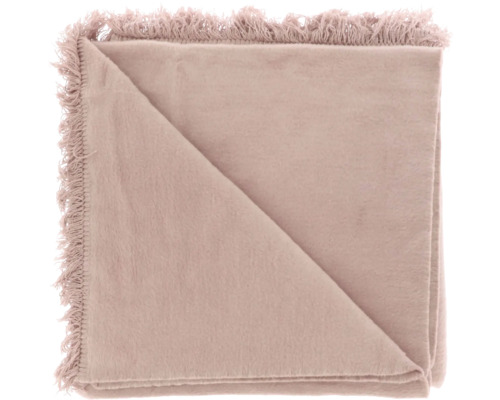 Gevouwen woondeken in roze met franjes aan de rand, zachte textuur.