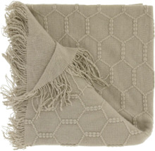 Gebreid plaid met honingraatpatroon en franjes.