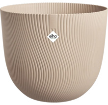 Ronde, beige bloempot van Elho met een golvende, verticale textuur van kunststof.