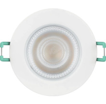 Ronde LED inbouwspot in het wit met een gestructureerde lens en bevestigingsklemmen aan de zijkant.