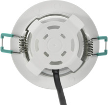 Achteraanzicht van een ronde witte LED inbouwspot van kunststof met klemveren en kabel.