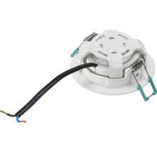Achteraanzicht van een ronde LED-inbouwspot met zwarte aansluitkabel en twee metalen veerklemmen voor montage.