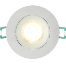 Ronde LED inbouwspot met wit frame, brandende lichtbron en montageklemmen aan de zijkant.