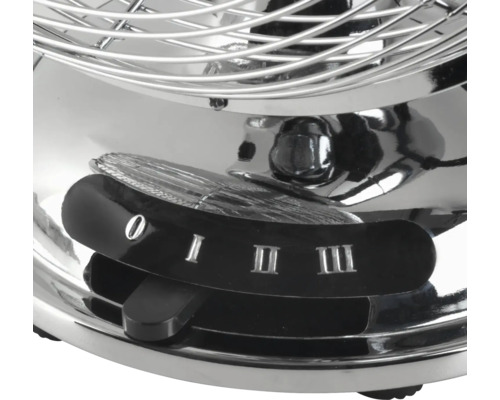 Detailopname van de snelheidsregelaar van een metalen vloerventilator met vier standen.