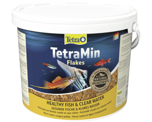 TetraMin vlokken visvoer in emmer met natuurlijke ingrediënten voor gezonde vissen en helder water.