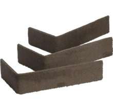 Drie L-vormige hoekstrips van steen met een ruw oppervlak voor wandbekleding.