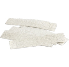 Witte steenstrips met een gestructureerd oppervlak in steenlook.