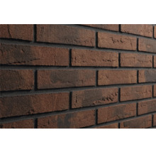 Steenstrips met baksteeneffect, gestructureerd oppervlak en donkere voegen voor binnen en buiten.