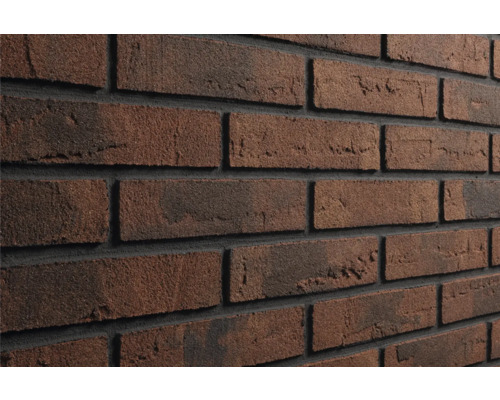 Steenstrips met baksteeneffect, gestructureerd oppervlak en donkere voegen voor binnen en buiten.