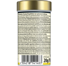 Achterzijde van een verpakking premium hoofdvoeding voor siervissen met voedingsinformatie en barcode.