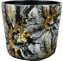 Keramieken bloempot met abstract bloemmotief in zwart-wit en goud.