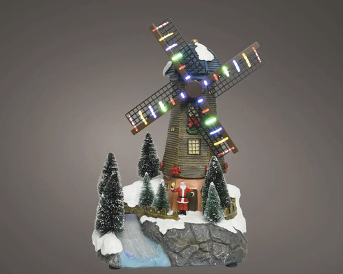 Kerstdecoratie windmolen met LED-verlichting, kerstman en besneeuwde dennenbomen op een rotsachtige basis