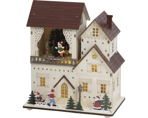 Kerstdecoratie van hout in de vorm van een huis met verlichting, kinderen op een slee, de kerstman en kerstbomen.