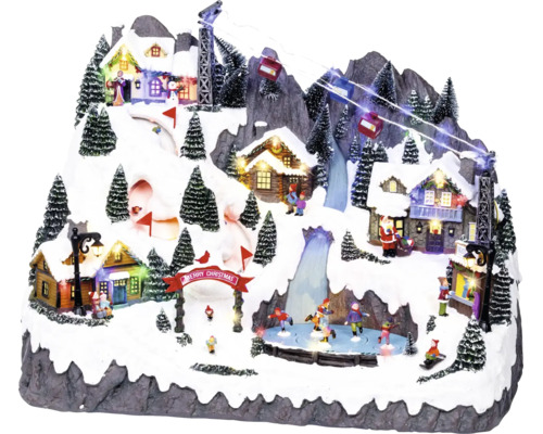 Geanimeerd kerstdorp op besneeuwde berg met kabelbaan, ijsbaan, verlichte huisjes en kerstbomen