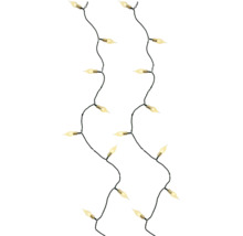Kerstverlichting met warmwit lichtgevende lampen in kaarsvorm en een donkergroene kabel.