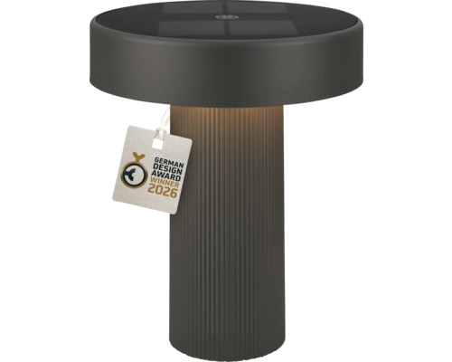 Moderne solar tafellamp in antraciet met geribbelde voet en label German Design Award Winner 2026.