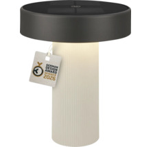 Cilindrische solar tafellamp met geribbelde witte voet en donker bovenstuk, zegel German Design Award Winner 2026.