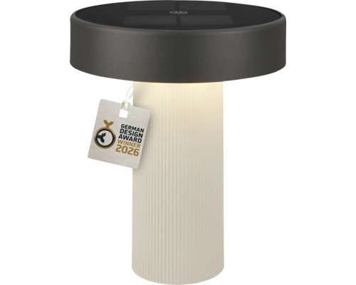 Cilindrische solar tafellamp met geribbelde witte voet en donker bovenstuk, zegel German Design Award Winner 2026.