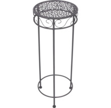 Ronde plantenstandaard van metaal met decoratief gatenpatroon en ornamenten.