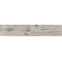 Vloerbedekking in grijze houtlook met nerf en noesten.