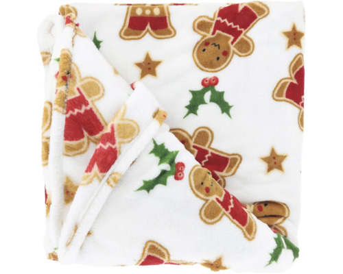 Zachte pluche kerstdeken met motieven van peperkoekmannetjes, hulst en sterren.