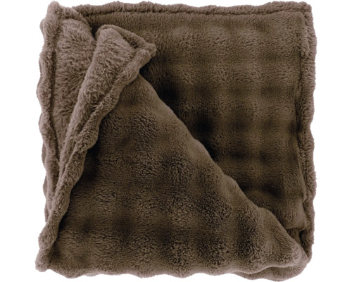Pluizige fleece deken van imitatiebont in de kleur bruin.