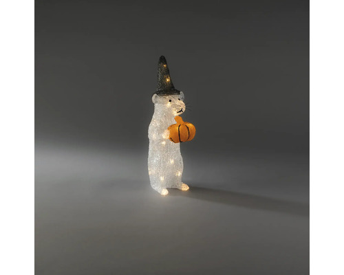 Verlichte decoratiefiguur witte muis met zwarte heksenhoed en oranje pompoen, warmwit licht.