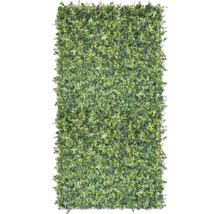 Kunstplantenwand met diverse bladvormen als privacyscherm.