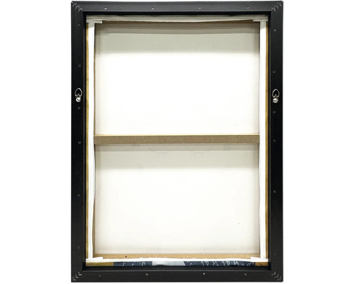 Achteraanzicht van een canvas schilderij in een zwarte baklijst met spieraam en metalen ophanghaken.
