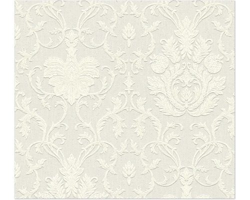 Gestructureerd vliesbehang in crème met een klassiek damastpatroon van florale ornamenten.