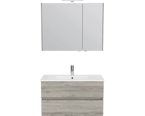 Badkamermeubelset bestaande uit spiegelkast, witte wastafel met kraan en grijs houtlook wastafelmeubel met twee laden.