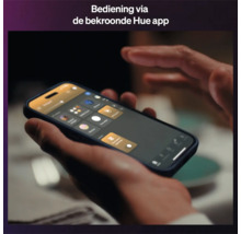 Bediening van de slimme verlichting via de Philips Hue app op een smartphone.