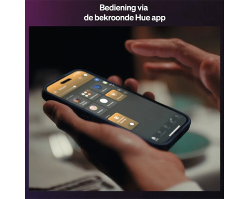 Bediening van de slimme verlichting via de Philips Hue app op een smartphone.