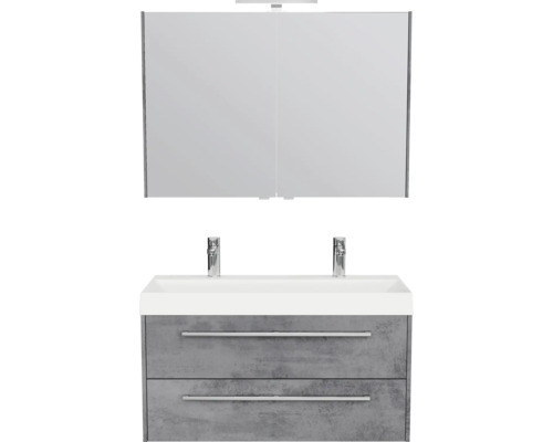 Moderne badkamermeubelset met grijze onderkast in betonlook, twee laden, witte wastafel, twee kranen en een spiegelkast.