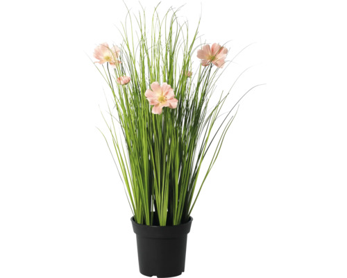 Kunstgrasplant met roze bloemen in zwarte pot.