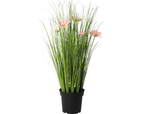 Kunstgrasplant met roze bloemen in zwarte pot.