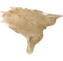 Koeienhuid vloerkleed van echt bont in beige met natuurlijke vorm.