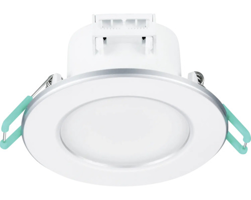 Ronde LED inbouwspot met montageklemmen en matte afdekking voor plafondmontage.