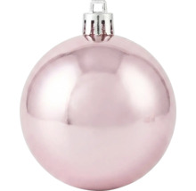 Glanzende roze kerstbal met zilveren ophangoog.