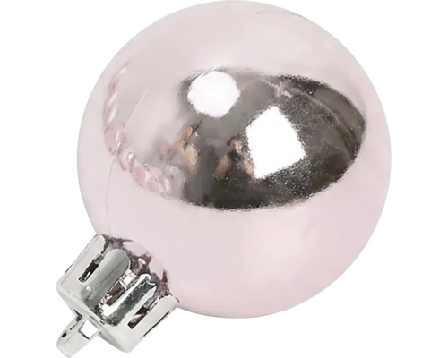 Glanzende roze kerstbal met zilveren kapje.