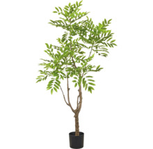Kunstmatige boom met veel groene bladeren in een zwarte plantenpot