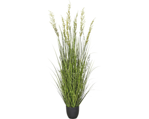 Kunstgras in zwarte pot met groene sprieten en aren.