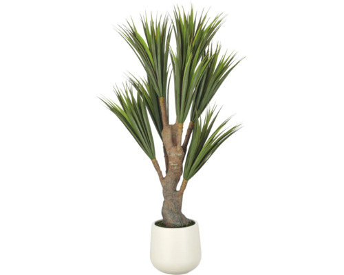 Kunstplant Yucca met lange, spitse bladeren en getextureerde stam in een witte pot.