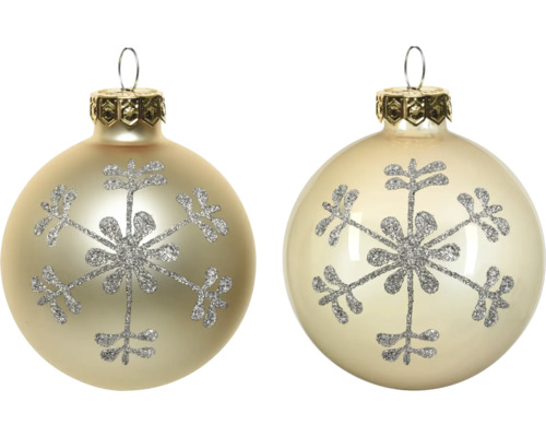 Twee champagnekleurige glazen kerstballen met zilveren glitter sneeuwvlok en gouden kapje.
