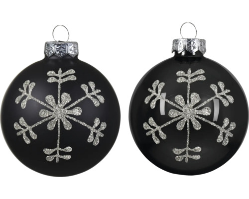 Twee zwarte kerstballen met zilveren glittersneeuwvlokken, één mat en één glanzend.