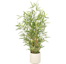Kunstbamboe plant met groene bladeren in een witte pot.